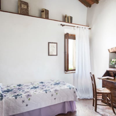 Damiano | A stone cottage with large shaded patio and expansive views
