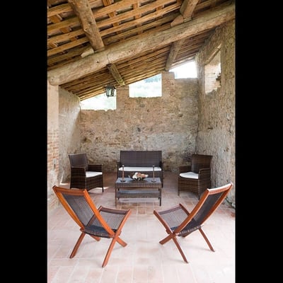 Damiano | A stone cottage with large shaded patio and expansive views