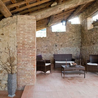 Damiano | A stone cottage with large shaded patio and expansive views