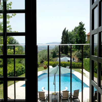 There is a little sitting area on the top floor with a view of the pool