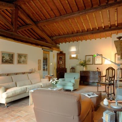 The living room has fabulous high beamed ceilings