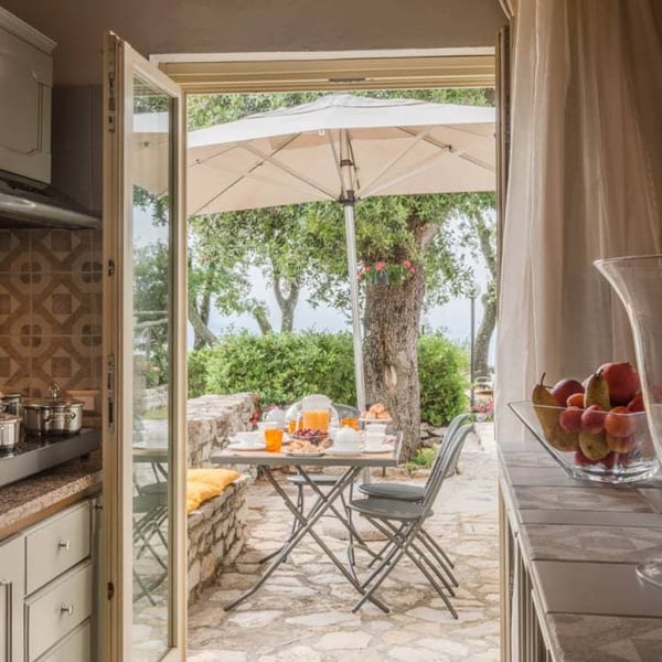 The kitchen opens out onto the garden