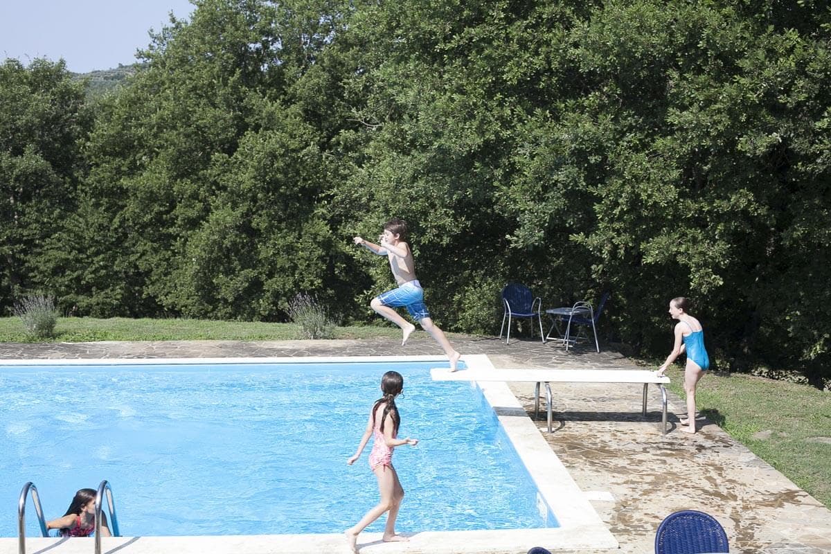Children in the pool in Tuscany