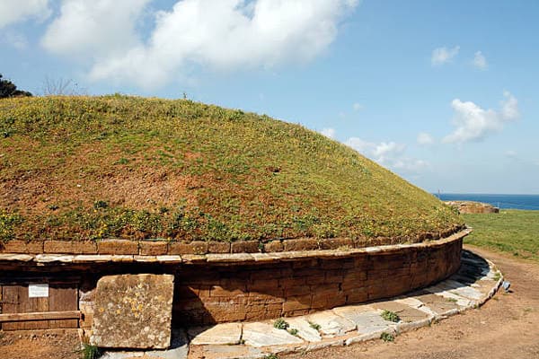 Other tombs are circular mounds with one opening